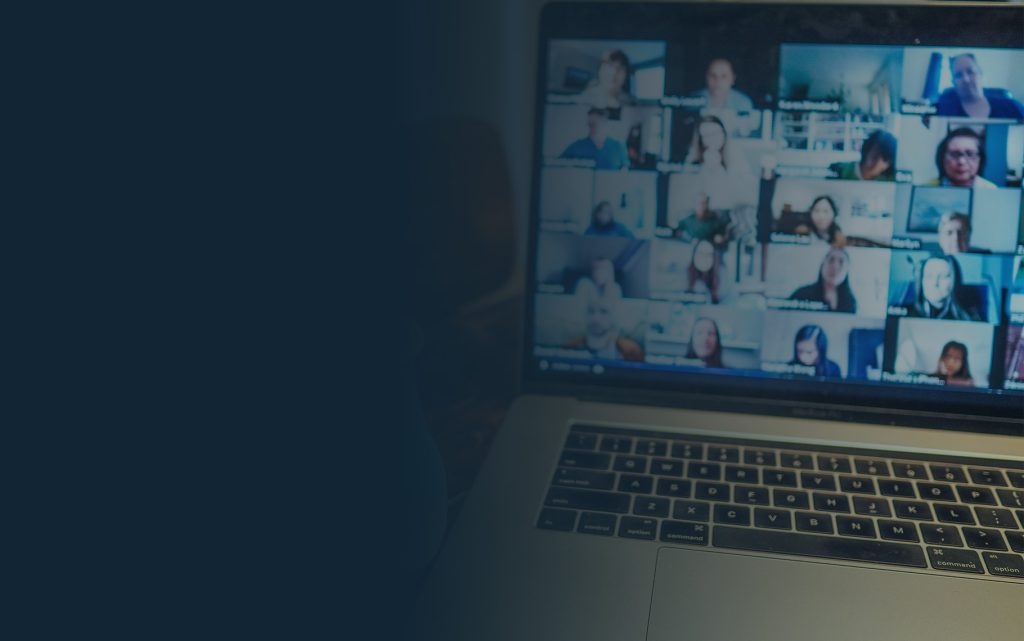 A laptop showing a grid of Online Mental Health Summit attendees on a video call