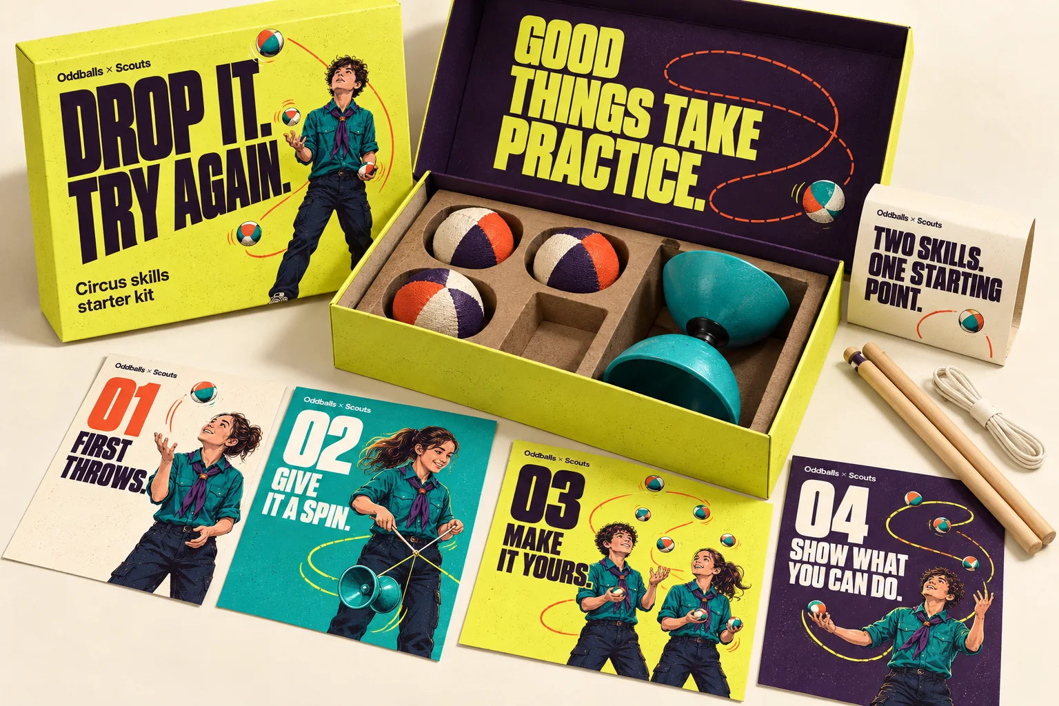 Concept mockup of the Drop it. Try again. starter kit: an acid-yellow box with an illustrated juggling Scout, the open lid reading Good things take practice, three juggling balls and a turquoise diabolo in a card insert, handsticks, string and four illustrated session cards.