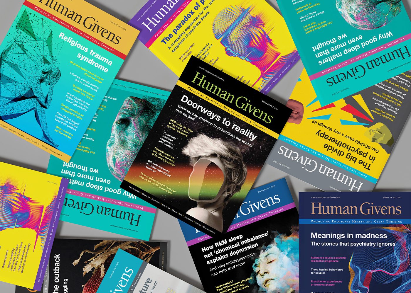 Human Givens Journal covers from several issues scattered across a dark surface